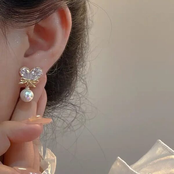 Casca's Crystal Wings Earrings - Image 2