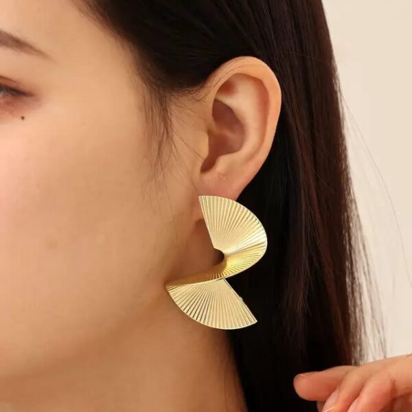 Casca's Golden Spiral Earrings - Image 5