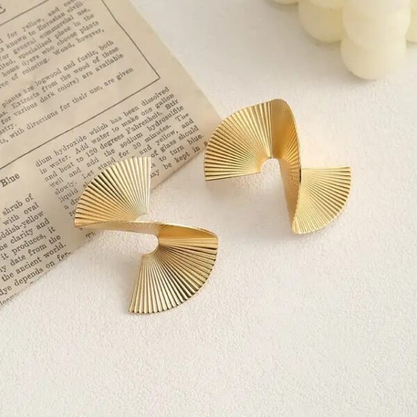 Casca's Golden Spiral Earrings - Image 4