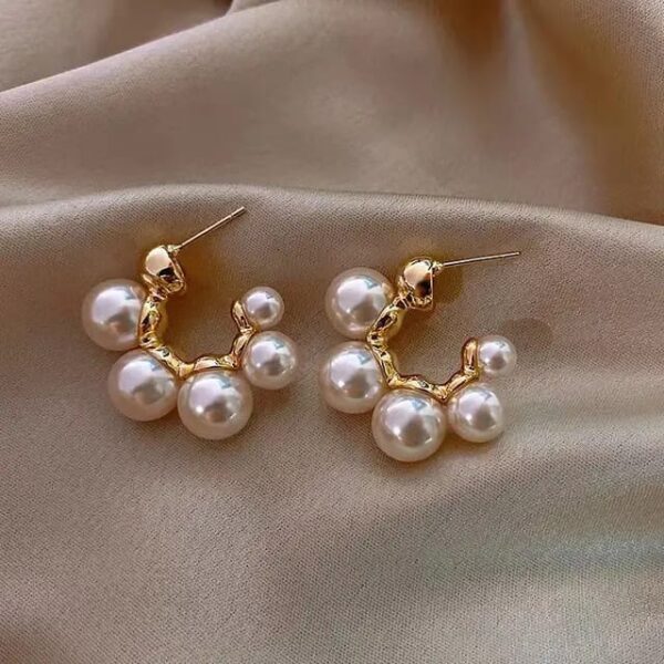 Casca's Semi Round Pearl Hoops - Image 2