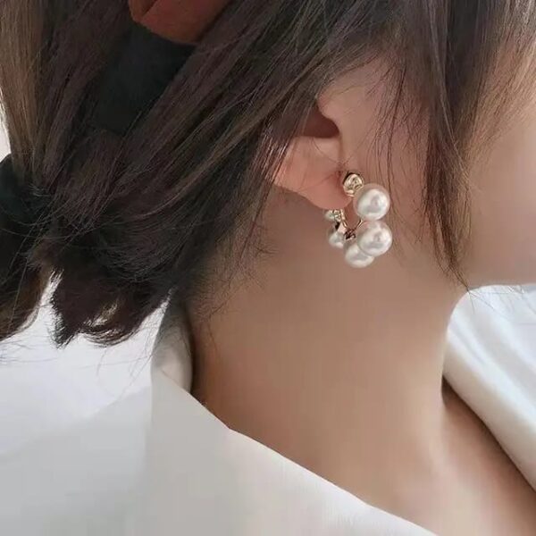 Casca's Semi Round Pearl Hoops - Image 4
